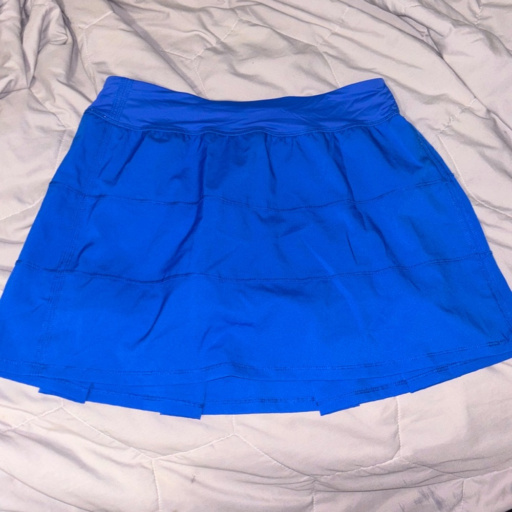 Vibrant Blue tennis skirt with ruffles in the back